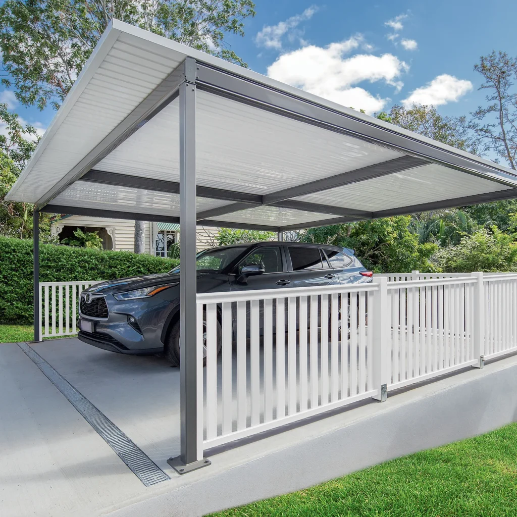 Residential car shade solution installed beside a home.